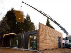 Une maison en bois montée en... un jour !