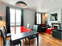Harmonie de gris pour redonner un style à un deux-pièces parisien