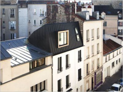 Un duplex né d'une surélévation en milieu urbain dense