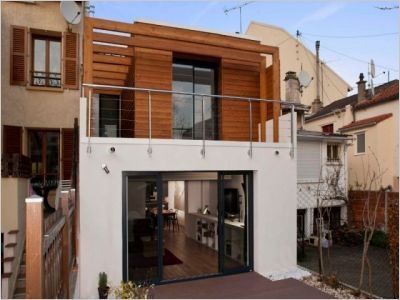 Extension boisée et aérée pour une maison mitoyenne
