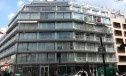 Quatre programmes pour un immeuble d'angle