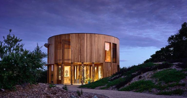 Une cabane de plage australienne aux allures de maison bois ronde