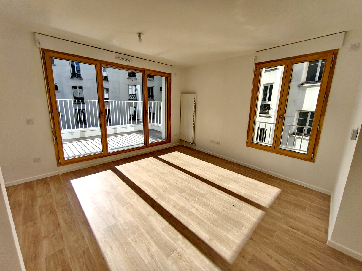 Béton, pierre massive, bois et béton de chanvre pour 15 logements neufs à Paris