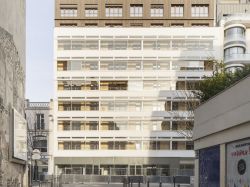 Rénovation atypique : un ancien garage transformé en logements collectifs