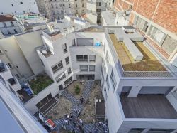 Un garage transformé en logements sociaux au coeur de Paris